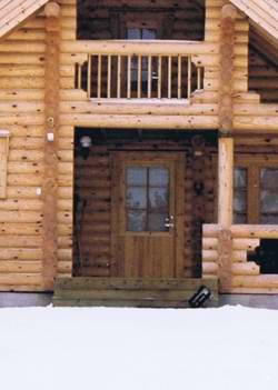 Lots of Scandinavian log cabins have a covered entrance area